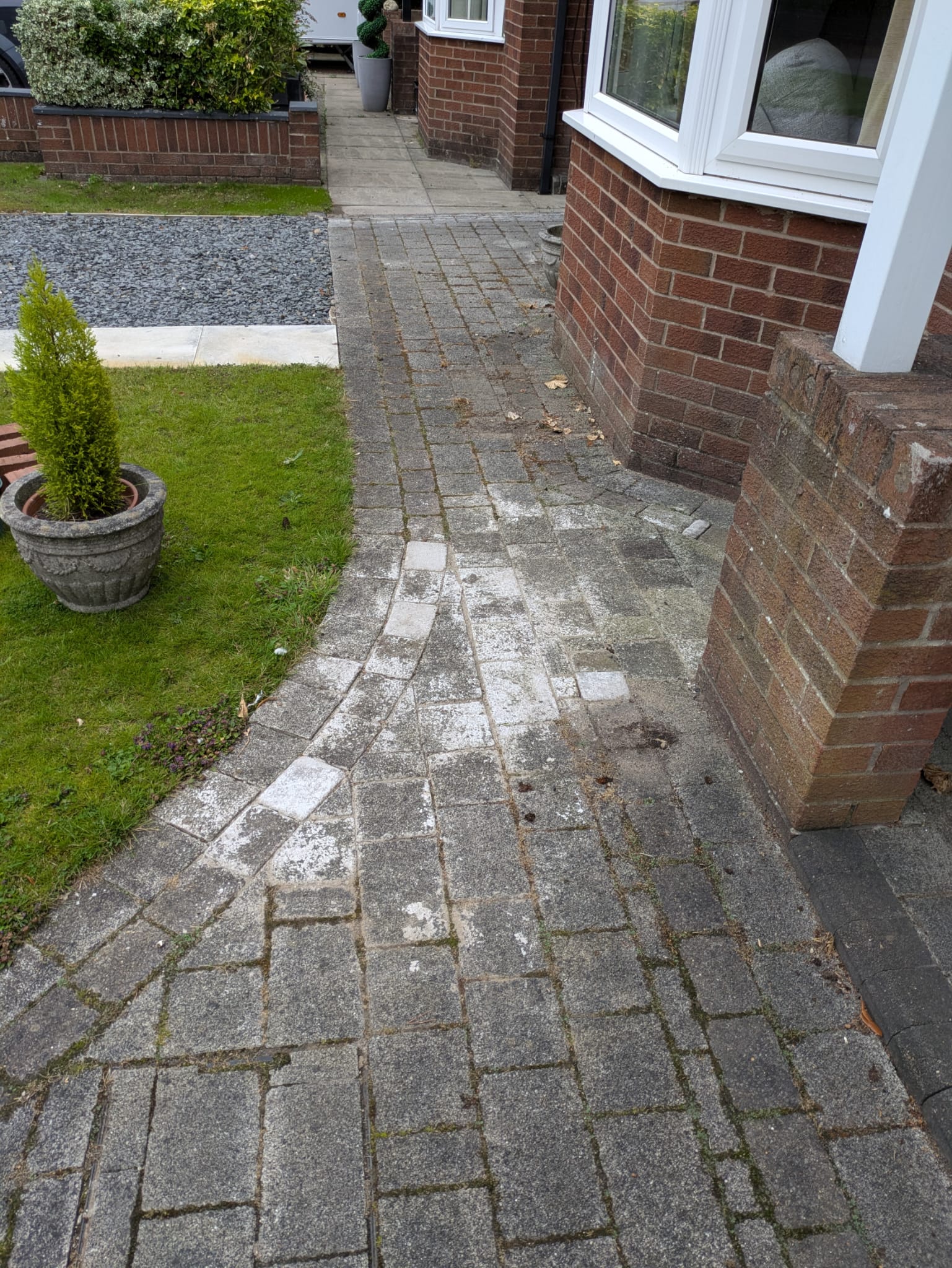 Stained concrete patio before cleaning